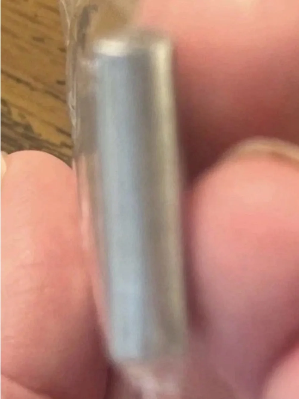Victoria's Secret stainless steel keychain with a laser-cut VS logo